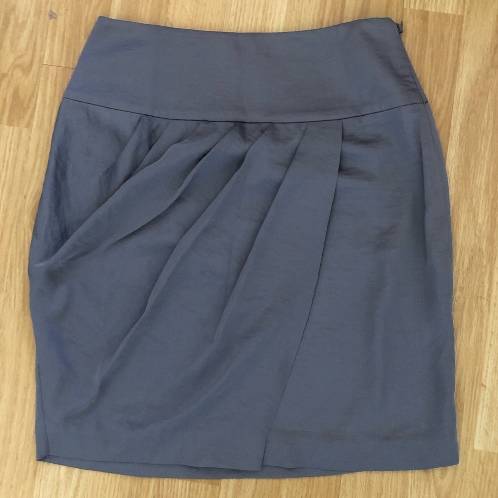 Pleated faux wrap mini skirt.